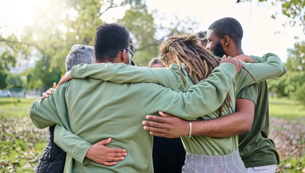 aa 2024 group hug in nature setting